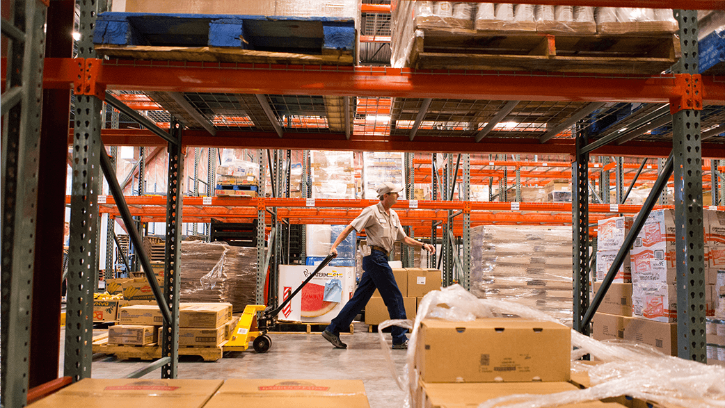 A Man Working In A Warehouse