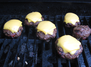 Mini burgers on grill