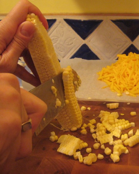 busy-corn-cutting-cropped-shot