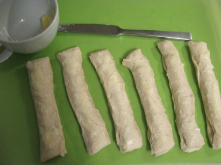 Butter the dough
