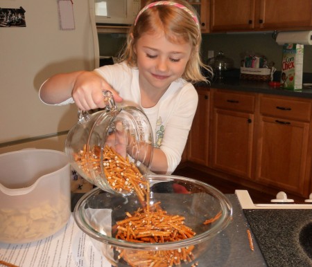 Add pretzels to bowl