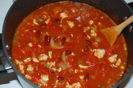 chopped tomatoes, tomatoes in chili, adding tomatoes to chili