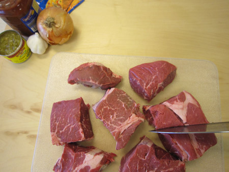 cutting meat, chuck roast, meat pieces