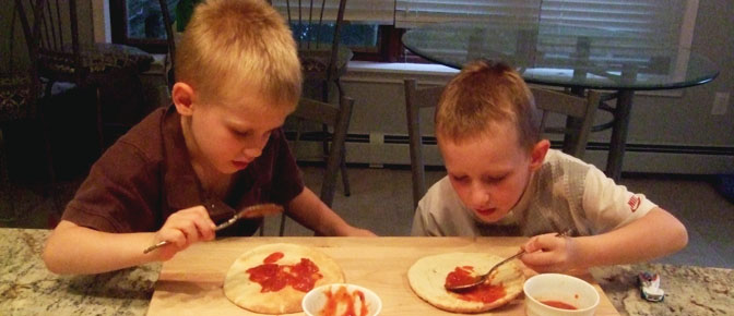 Boys Spreading Sauce