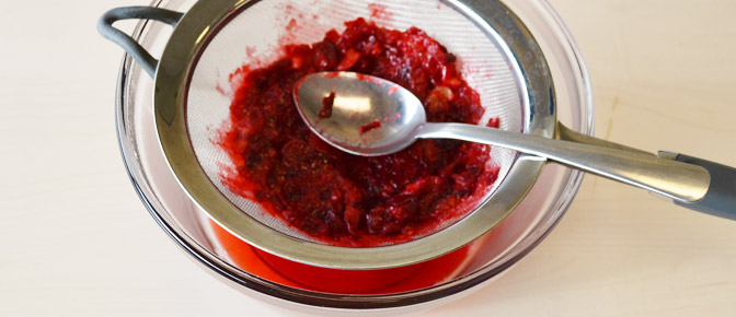 Mash Cranberry with Spoon