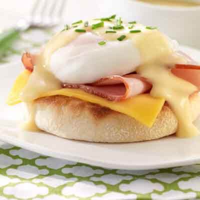 Cheesy Eggs Benedict image