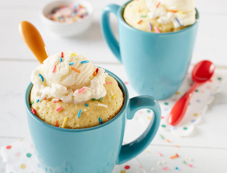 birthday cake in a coffee mug topped with ice cream