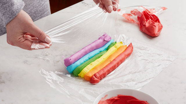 Piping and Rolling Rainbow Frosting
