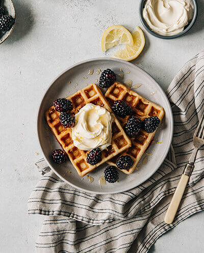 Waffles Topped With Honeyed Mascarpone Lemon Zest And Blackberries Recipe Vermont Creamery